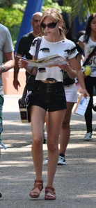 Skinny blonde chick in little denim shorts