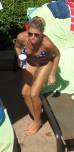 Blonde babe at the pool with sexy body in USA bikini