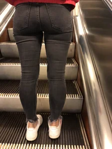 Candid Butt in Tight Black Jeans on a Subway Escalator  Photos
