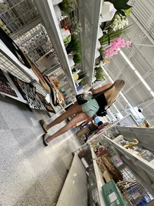 White chick with cheeks hanging out of green shorts