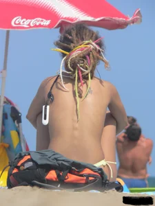 Sexy girls going topless at the beach showing off their sexy bodies