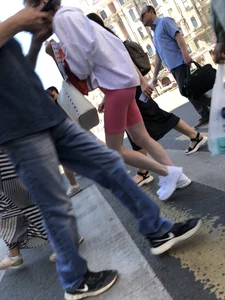 Awesome booty in spandex shorts, candid girl on a sidewalk