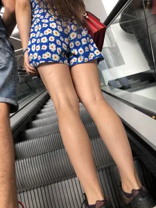 Girl with Hot Legs in a Colorful Summer Dress on the Mall Escalator Creepshots