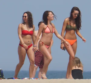 3 sexy girls on the beach in bikinis