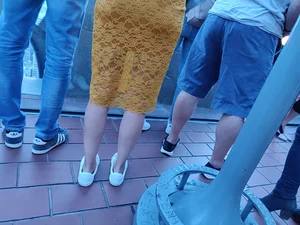 Booty and legs in semi-transparent lacey dress creepshot