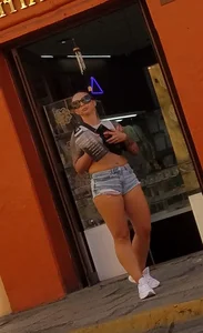 Nice legs and a little peach showing, shorts