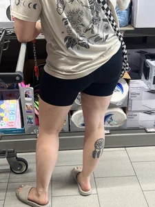 Milf in black biker shorts and flip flops
