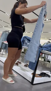 Girl Wearing Black Top And Tight Black Shorts (Upshots)