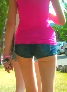Skinny babe in denim shorts with a nice gap showing ass cheeks