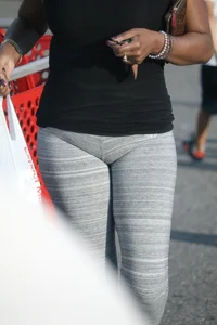 Ebony milf out shopping in grey leggings