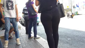 Sexy ass in leggings waiting for the bus