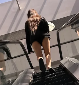 Beautiful brunette college girlwith sexy legs