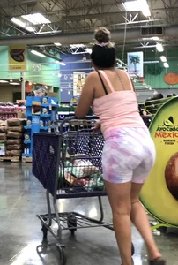 Thick Latina babe with a nice ass in tight patterned shorts