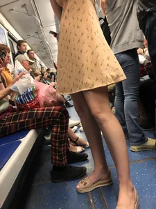 Cute Girl in a Dress with Skinny Legs in Sandals Subway Train Candid Photo