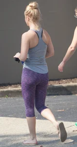 Sexy blonde out walking in purple leggings with a nice ass