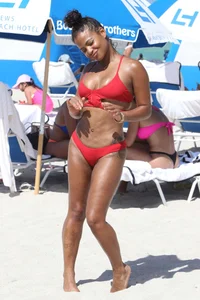 Christina Milian in red bikini in Miami with hard nipples