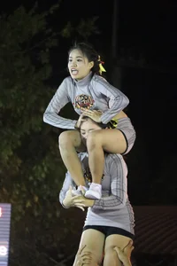 Bunch of athletic Thai cheerleaders at a competition