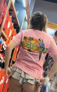 Petite light skin Latina with ass hanging out of skirty shorts