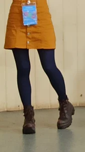 Girl in a Yellow Skirt And Dark Blue Pantyhose Legs Closeup Creepshot