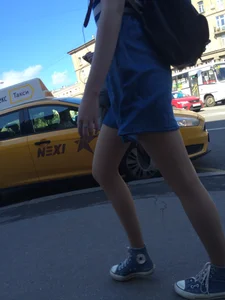 Girl in a Skirt With Sexy Skinny Legs Walking Down a Street Creepshots Collection