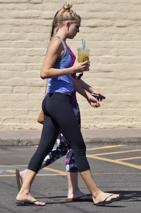 Sexy blonde and friend walking in leggings