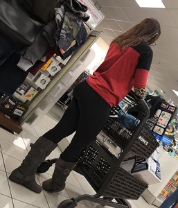 Brunette with a tight butt, boots, and a VPL