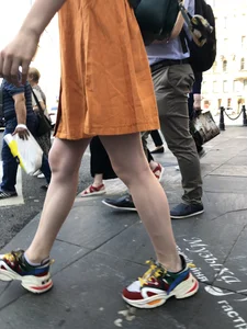 Cute Teen Girl in a Dress With Slim Legs Standing in the Subway Train, Then Crossing the Street Photo Gallery