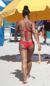 Christina Milian in red bikini in Miami with hard nipples