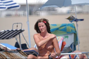 Girls on a nude beach in Bibione, Italy