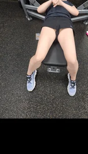 Candid gym girl flashing her panties while working out