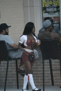 Sexy ebony Tilted Kilt employee in her uniform