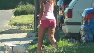 Thick booty babe walking her dogs in pink shorts