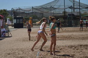 Beach volleyball blonde looking sexy and showing her body off