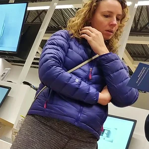 Blonde lady shopping in tight dark grey leggings