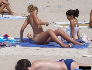 Sexy candid topless and nude beach girls