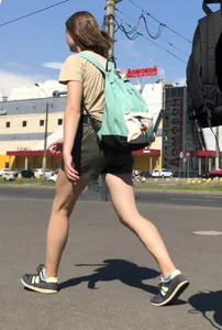 Cute Dorky Girl in Shorts with Thin Muscular Legs Street Candid Photos
