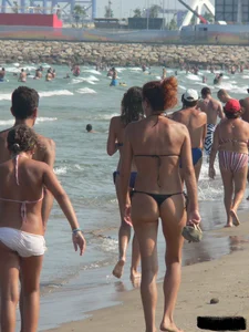 Bunch of sexy babes at the beach in thong bikinis