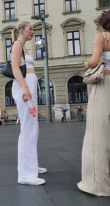 Long blonde braless in a white outfit (many pictures)