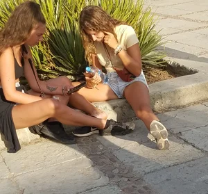 2 girls in short shorts showing legs and a little more part 2