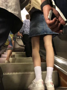 Girl in Denim Skirt with Thin Hot Legs in White Socks Subway Train and Escalator Creepshot
