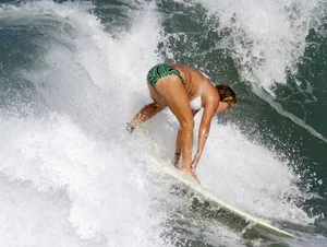 Candid surfer babes on the beach and in bikinis