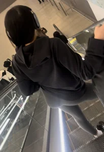 Tight curvy latina at airport pulls up pants