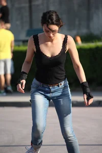 Skinny Girl in Tight Jeans on a Skateboard Candid Photos Gallery