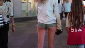 Cheeky sexy babe tourist out in tiny green jean shorts