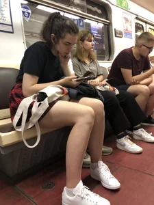 Cute Girl With Nice Legs in the Subway Train Candid Pics Gallery