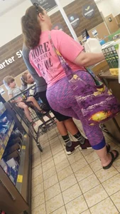 Fat booty milf in purple leggings at the grocery store