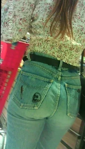 Sexy girl grocery shopping in jean with a nice ass