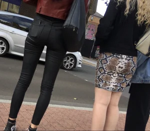 Chav brunette with a nice ass and vpl in tight black leather pants