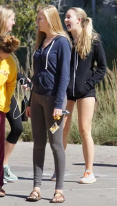 Skinny Arizona State University blonde college girl in grey leggings