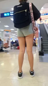 Latina green short showing cheecks [OC]